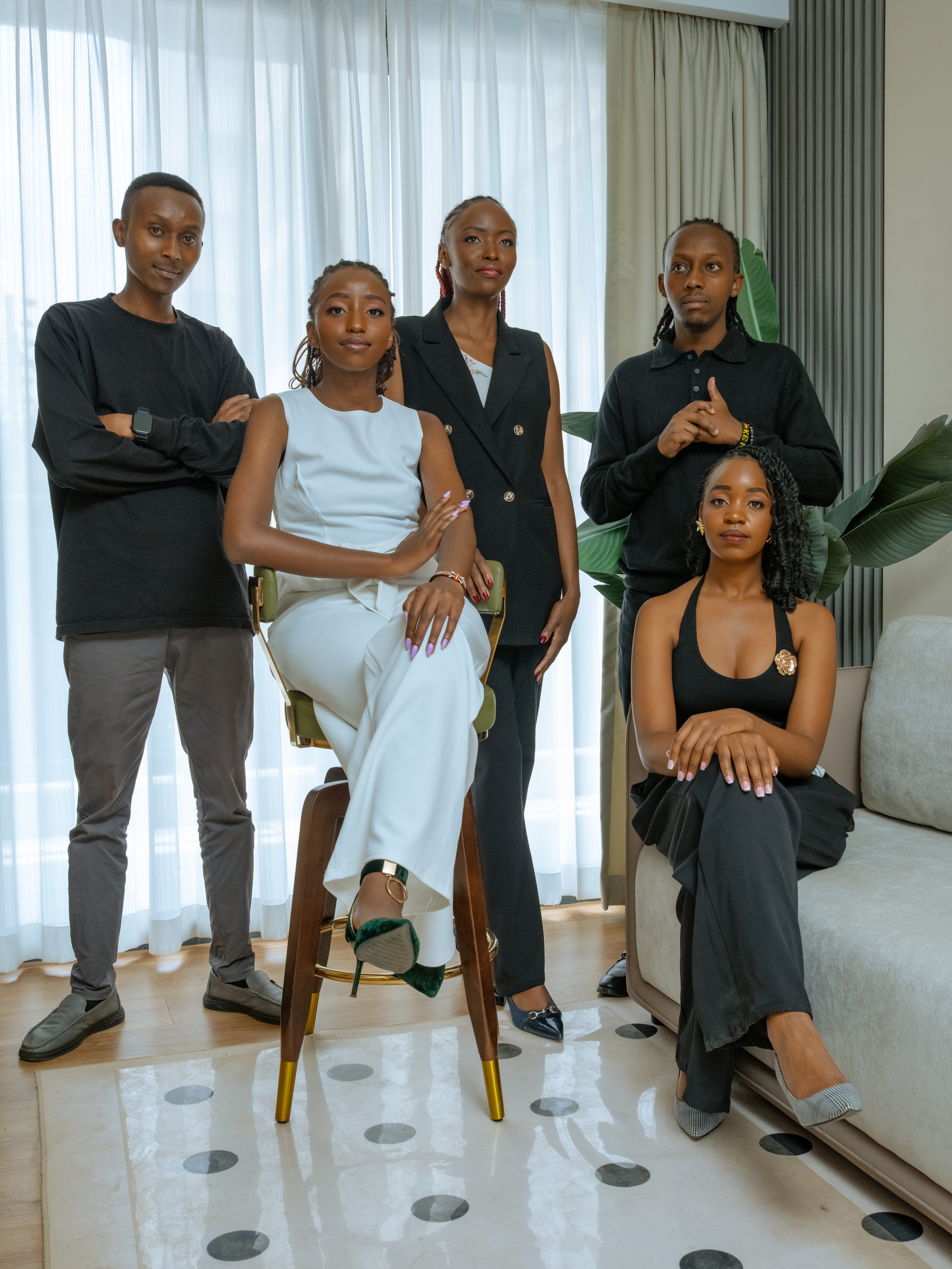 Brand identity workshop materials arranged in a minimalist studio setting.